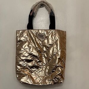 Victoria's Secret Metallic Gold Tote with Black Handles.